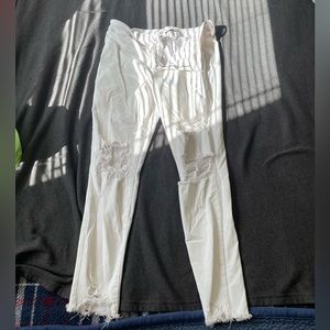 White AE ripped skinny jeans. Extra stretch material. Size 14